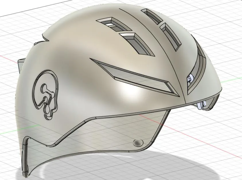 CAD render of the helmet shell showing ventilation slots and the rear control enclosure.
