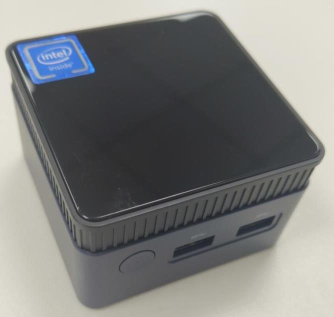 The compact N100 computer used for local processing.